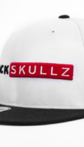 White Snapback hat with black brim and logo