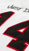 mens white hockey jersey with black and red stripes number 14 and just different