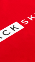 zoom in on BlackSkullz logo - womens red long tshirt